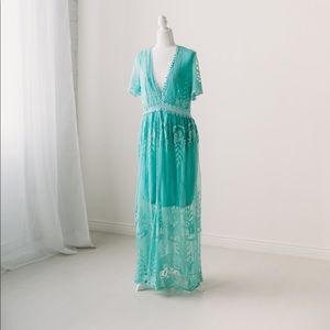 Women’s turquoise dress.